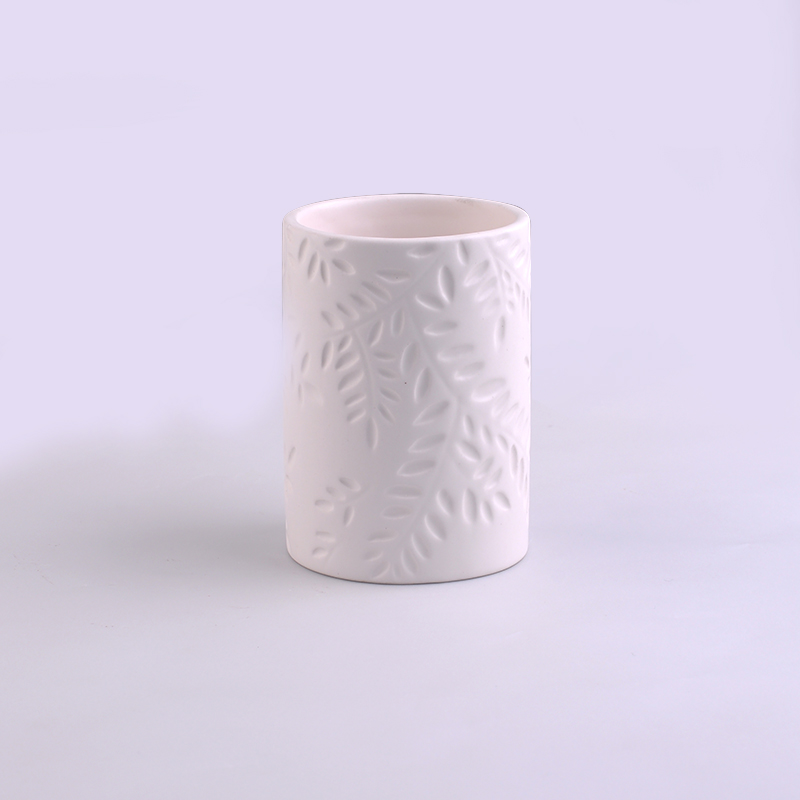 White ceramic votive candle cup