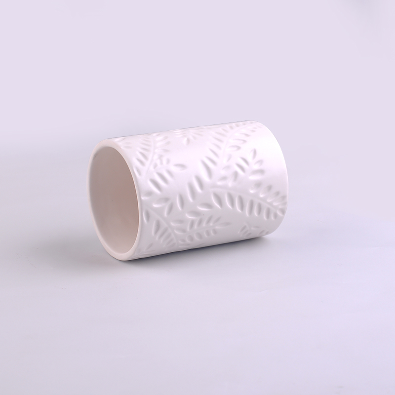 White ceramic votive candle cup