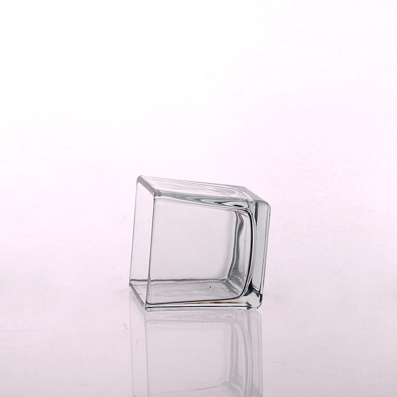 Cuboid clear glass tealight holder
Cuboid clear glass tealight holder