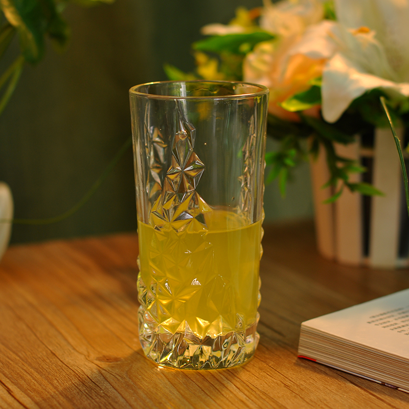 Tall glass cup with attractive emboss