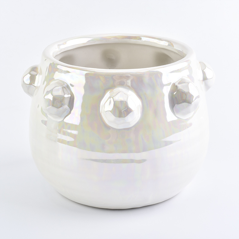 white shiny ceramic candle jar with emboss
white shiny ceramic candle jar with emboss