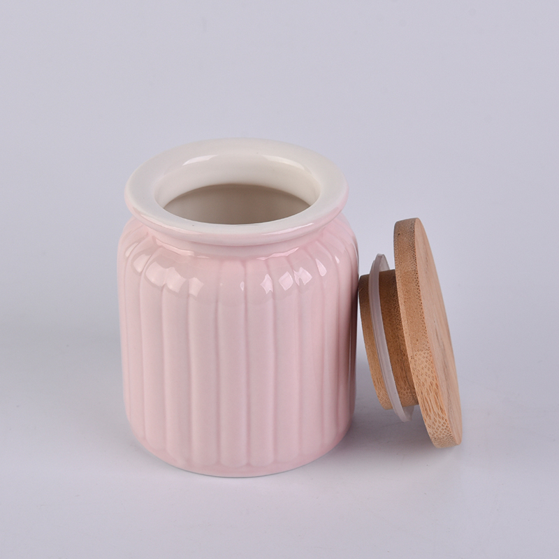 Pink ceramic jar with stripe pattern 