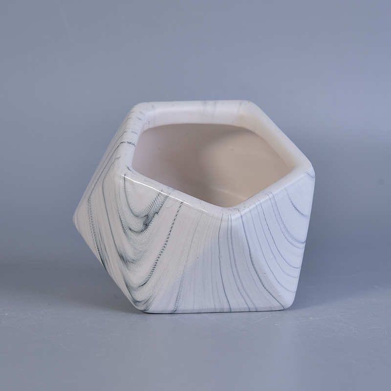 Geometrical shape ceramic container with marble pattern