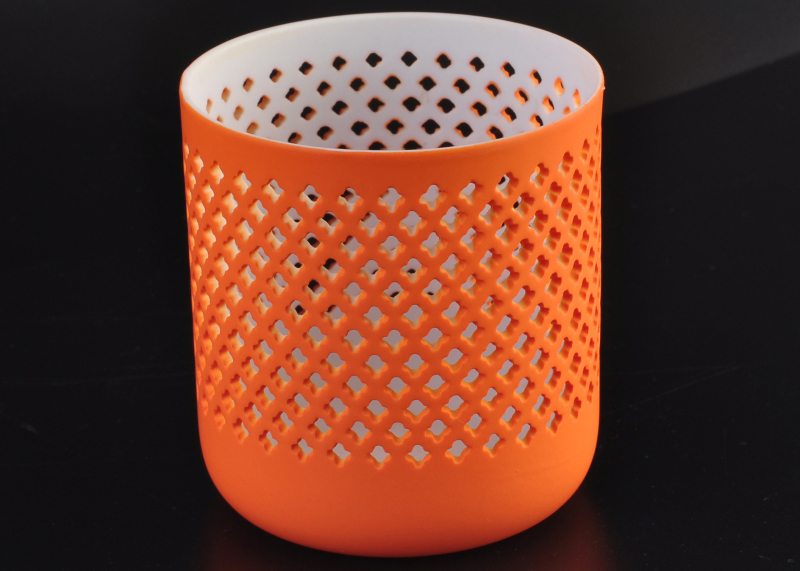 Orange sprayed grid hollow ceramic candle holder