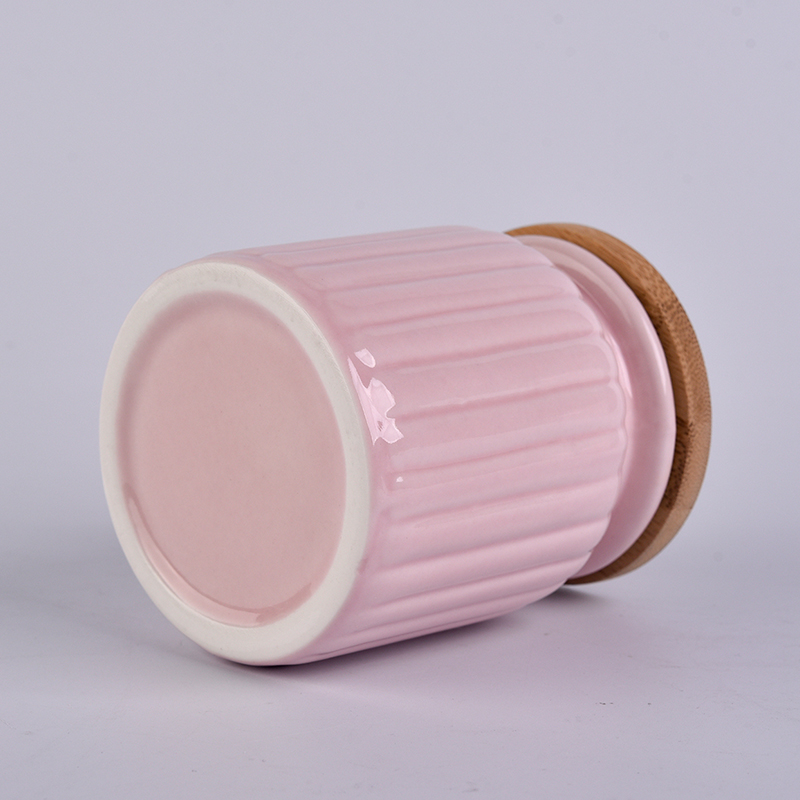Pink ceramic jar with stripe pattern 