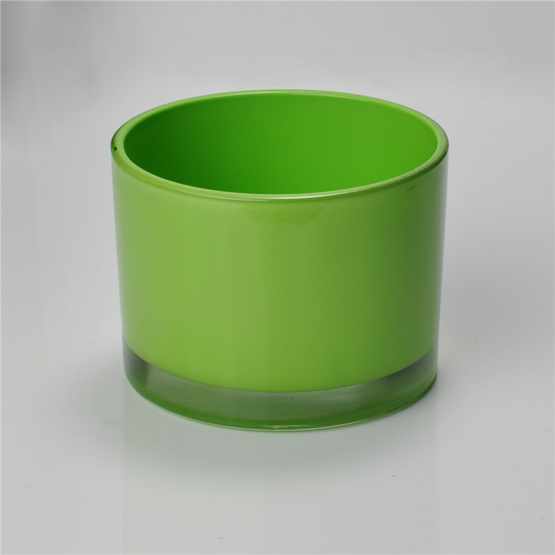 Green round straight-sided glass candle holder Green round straight-sided glass candle holder