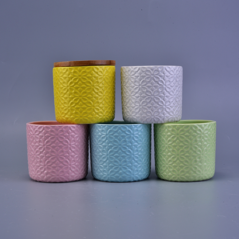 Green round straight-sided ceramic candle holder
matte embossed cyliner ceramic vessel for candles