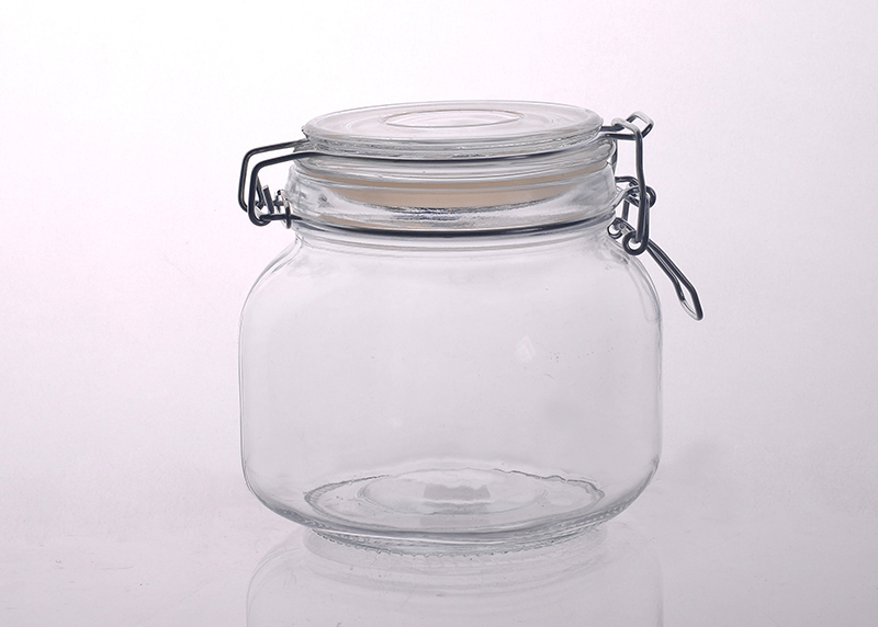 Clear glass squat straight-sided jar with neck finish