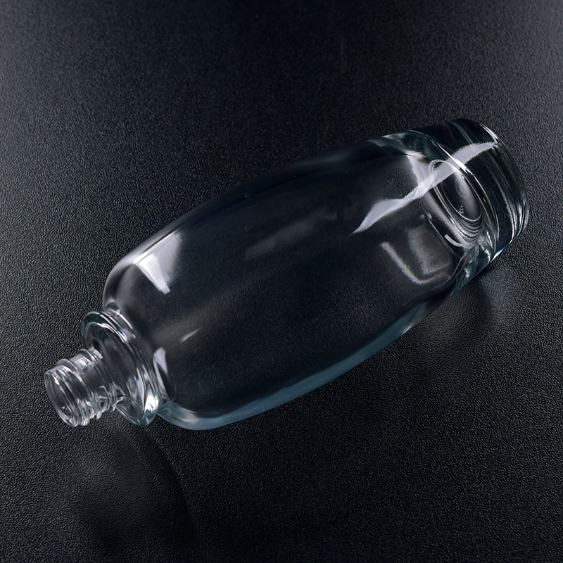 Oval transparent glass perfume bottle