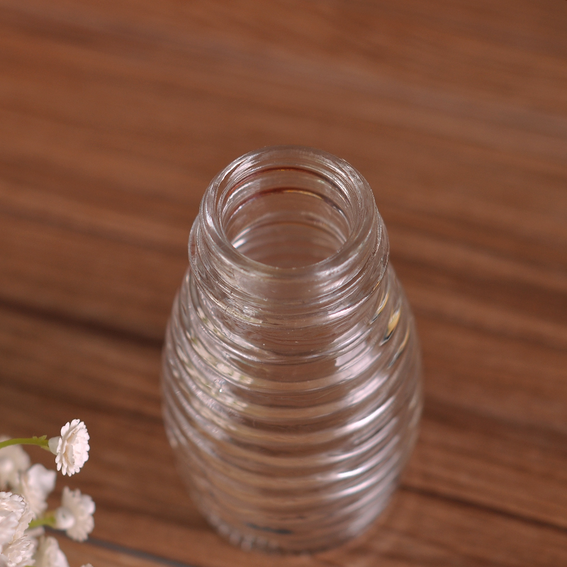 glass candle jar with cross grain