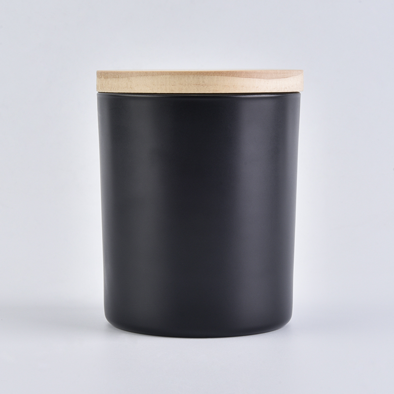 Black cylinder glass vessel for candles with wood lid