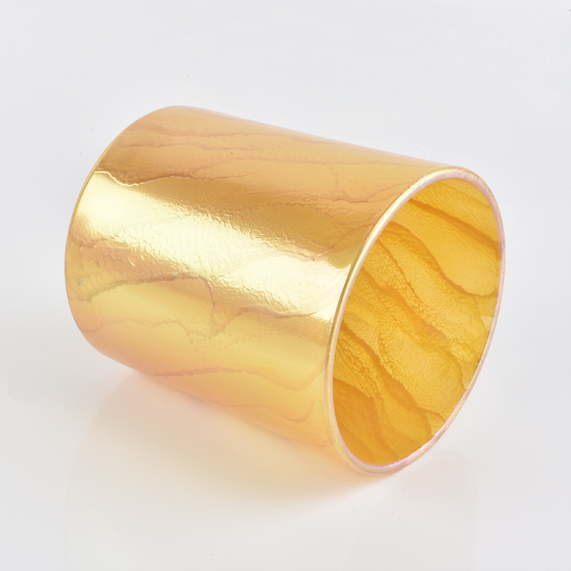 Yellow glass candle holder with desert pattern finish
