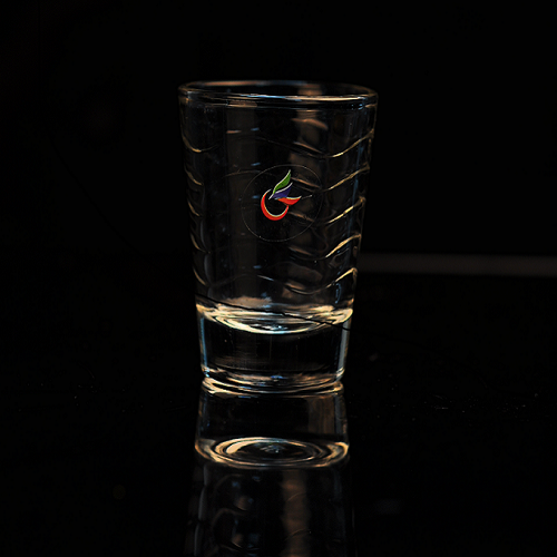 Glass tumbler with ripple pattern