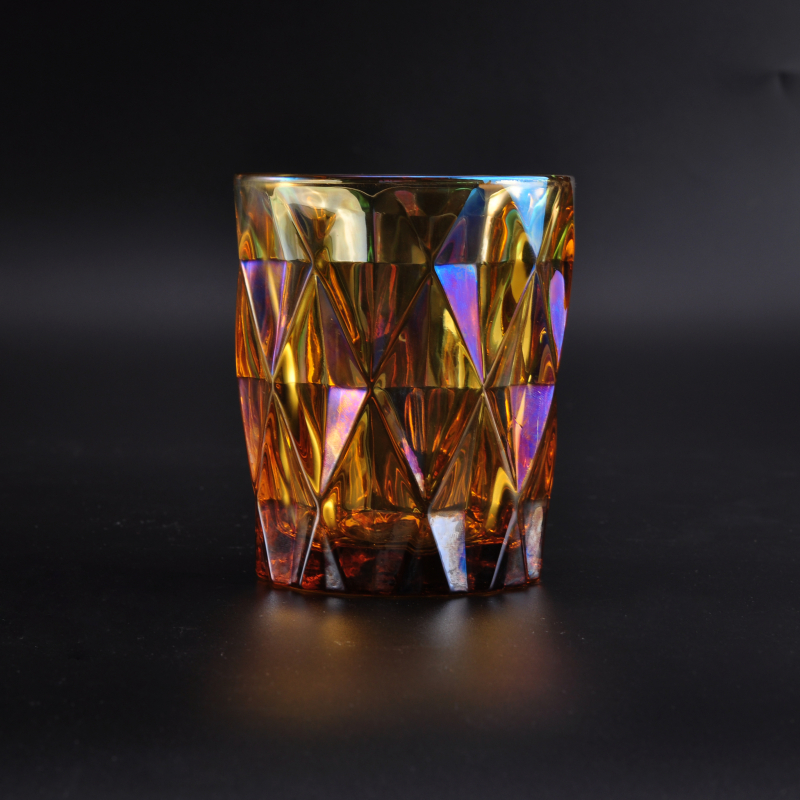 Iridescent glass candle holder with diamond-shaped pattern surface
Iridescent glass candle holder with diamond-shaped pattern surface