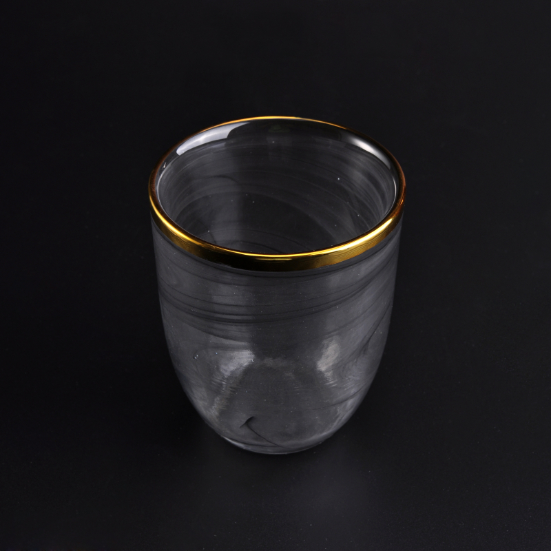Glass candle holder with black cloud dust effect
Glass candle holder with black cloud dust effect