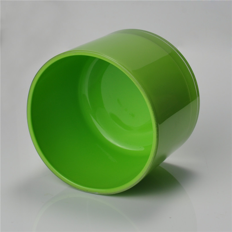 Green round straight-sided glass candle holder Green round straight-sided glass candle holder