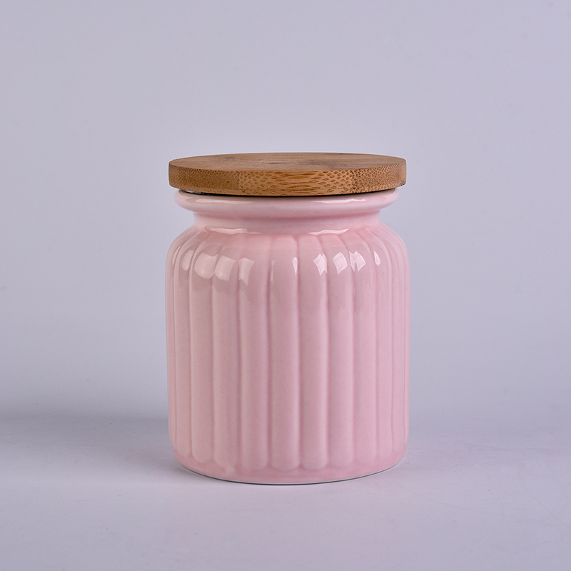 Pink ceramic jar with stripe pattern 