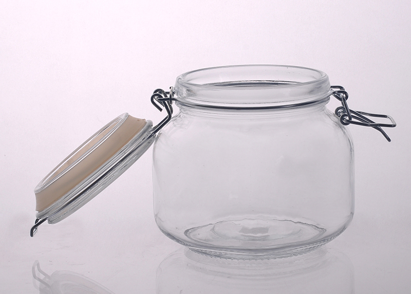 Clear glass squat straight-sided jar with neck finish