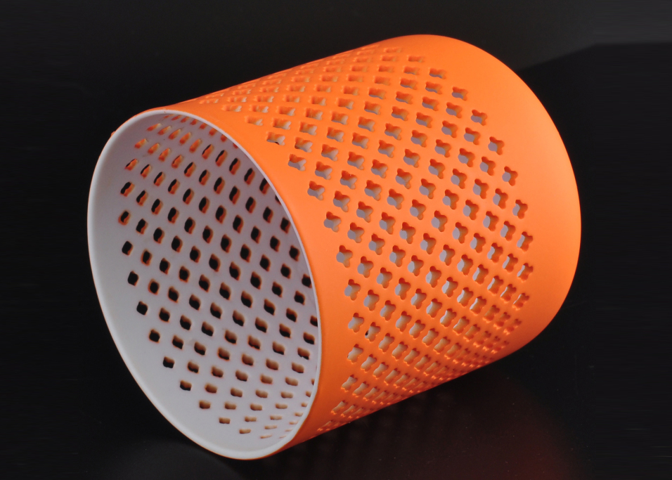 Orange sprayed grid hollow ceramic candle holder