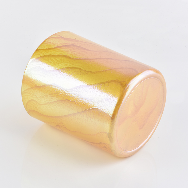 Yellow glass candle holder with desert pattern finish