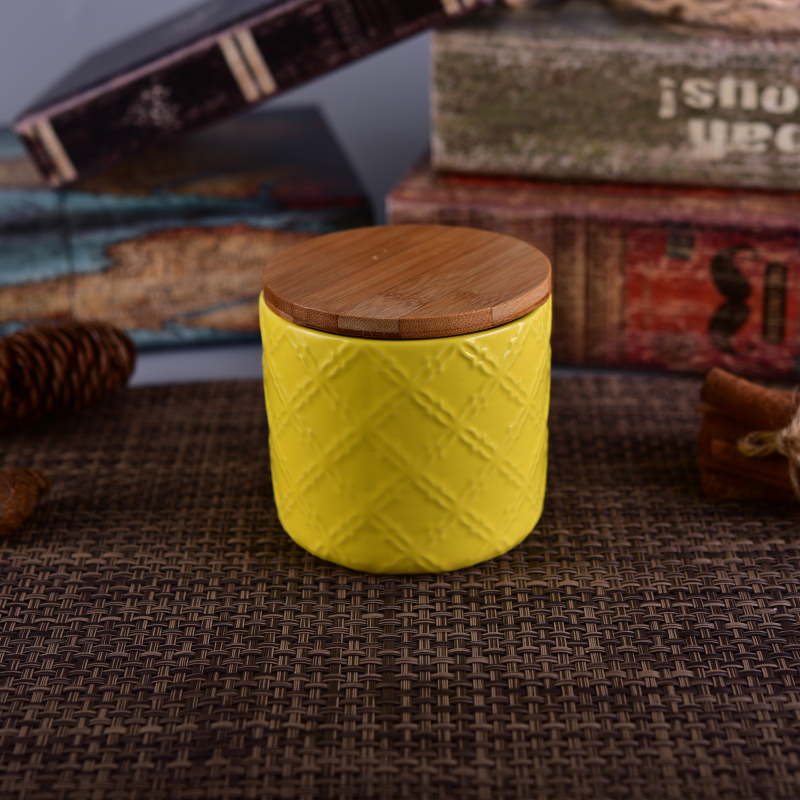 matte yellow embossed ceramic candle jar with wooden lid
matte yellow embossed ceramic candle jar with wooden lid