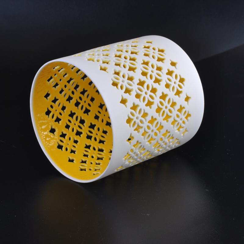 White hollow-out ceramic candle holder vessel flower pattern yellow inner
White hollow-out ceramic candle holder vessel flower pattern yellow inner