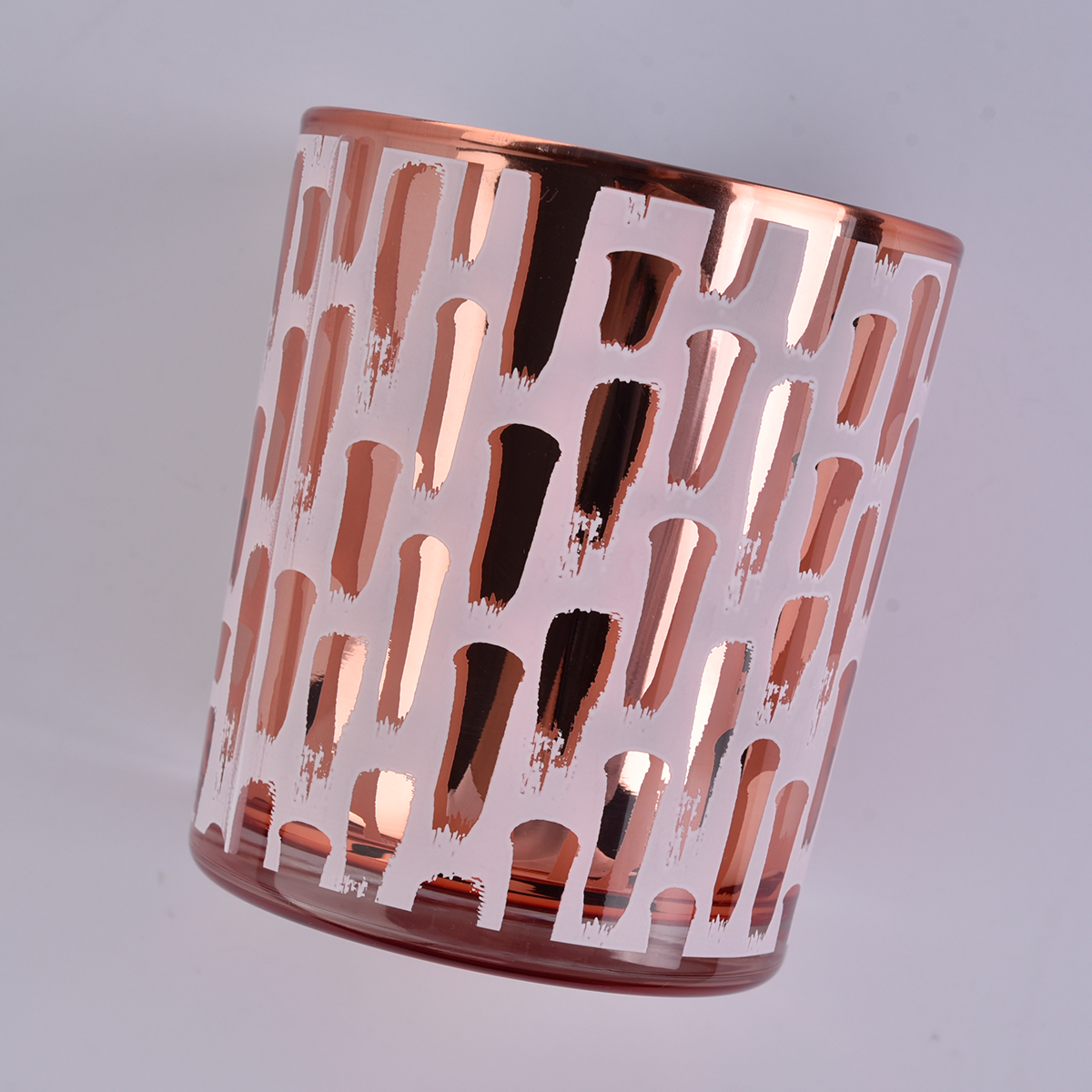 	rose gold cylinder glass candle jar with unique surface finish