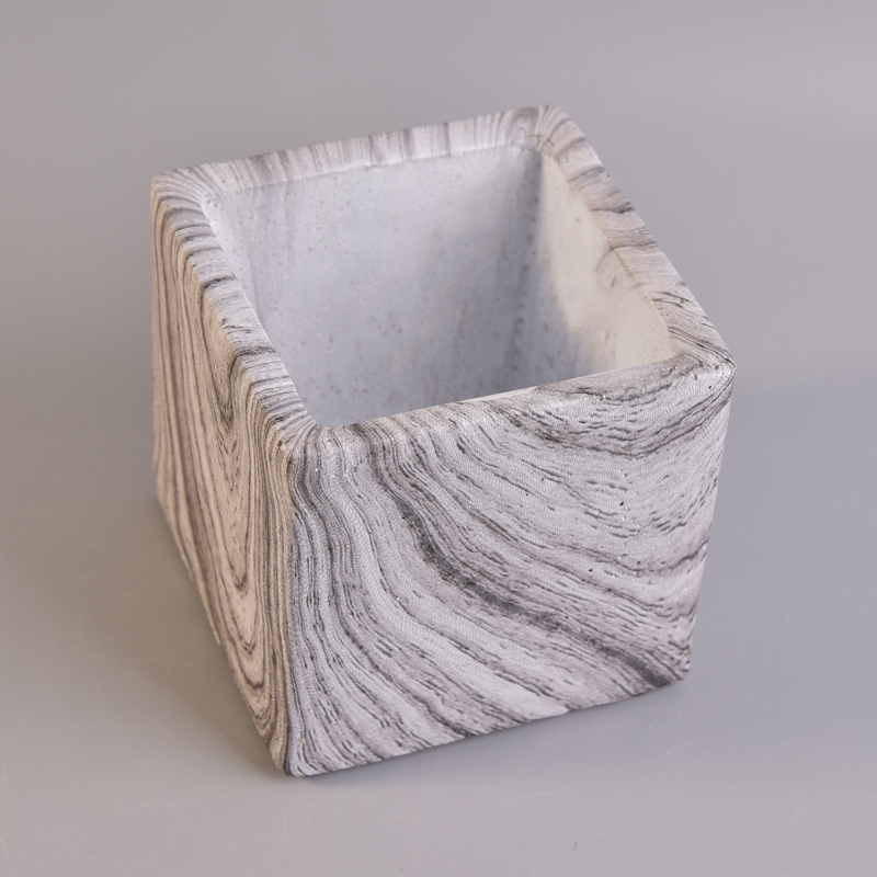 White square concrete candle holder with brown stripes pattern