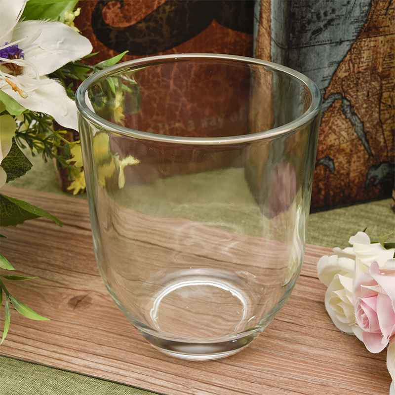 Elliptical transparent glass candle holder Elliptical clear glass candle holder