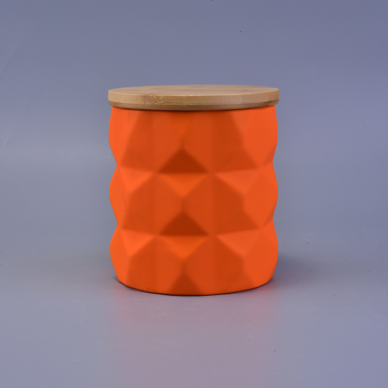 orange matte ceramic candle jar relief surface