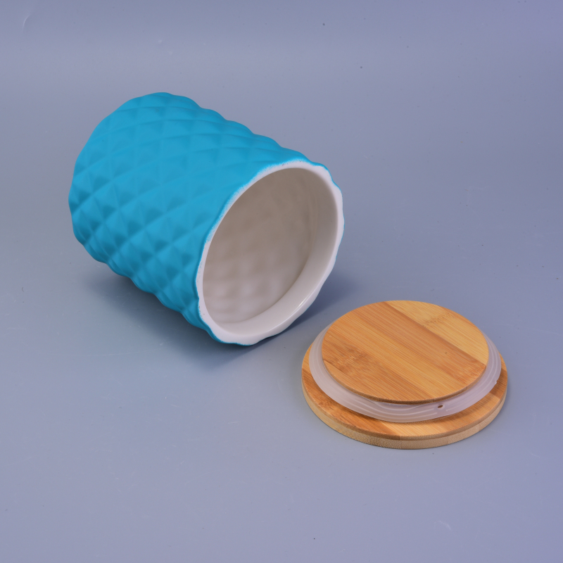 blue ceramic candle holder with diamond-shaped pattern surface blue ceramic candle holder with diamond-shaped pattern surface
