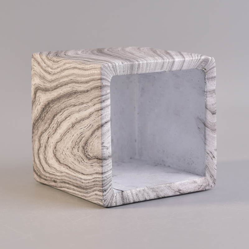 White square concrete candle holder with brown stripes pattern