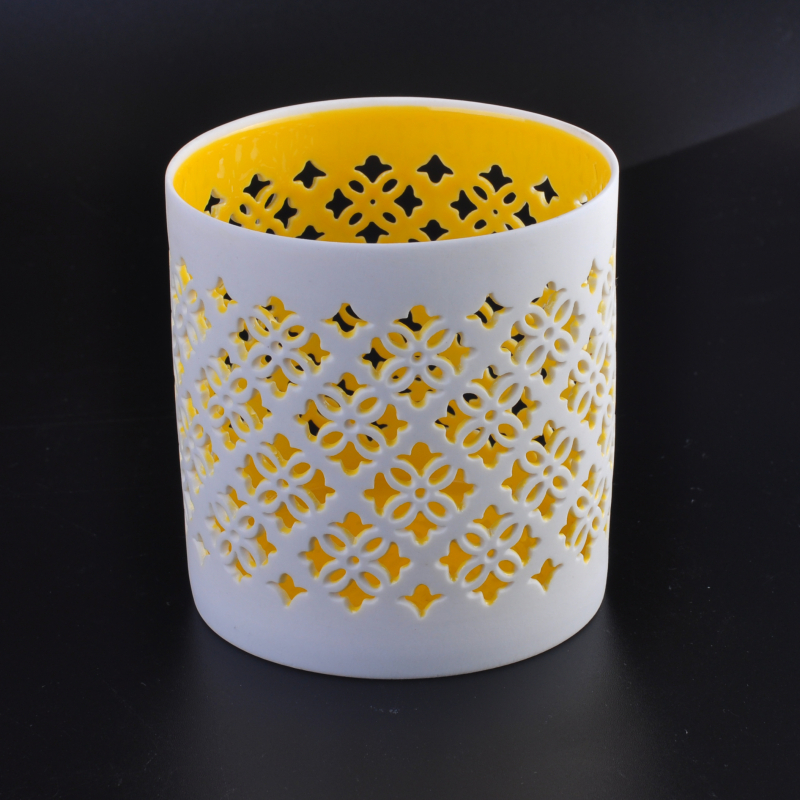 White hollow-out ceramic candle holder vessel flower pattern yellow inner
White hollow-out ceramic candle holder vessel flower pattern yellow inner