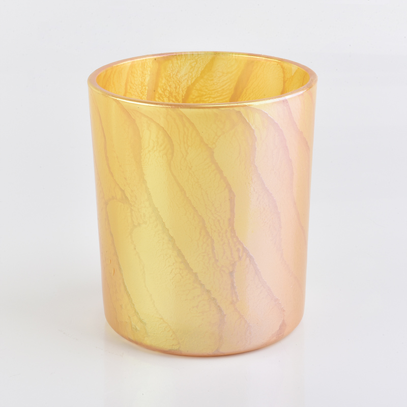 Yellow glass candle holder with desert pattern finish