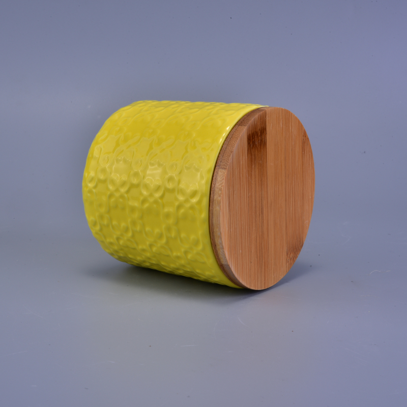 matte yellow embossed ceramic candle jar with wooden lid
matte yellow embossed ceramic candle jar with wooden lid
