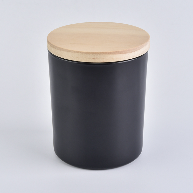 Black cylinder glass vessel for candles with wood lid