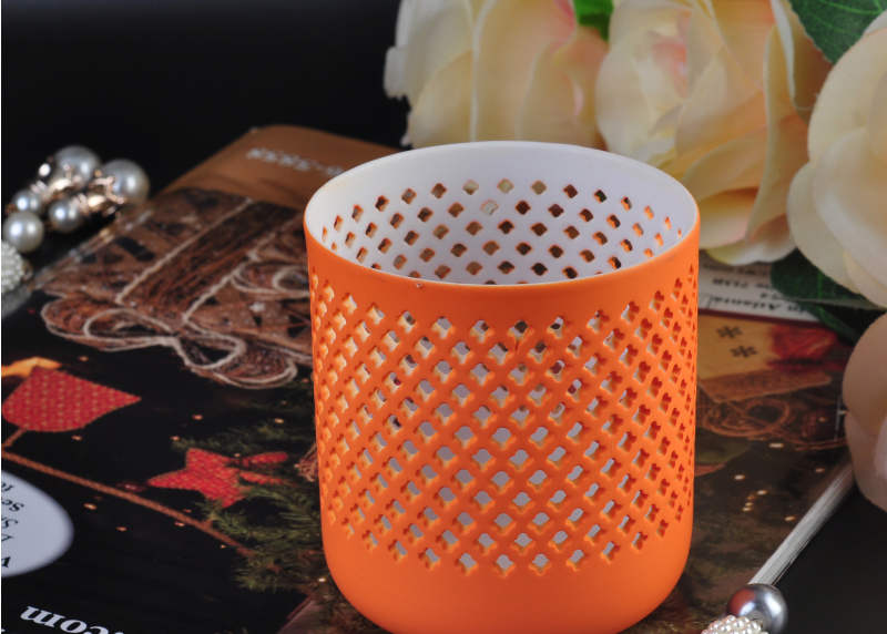 Orange sprayed grid hollow ceramic candle holder