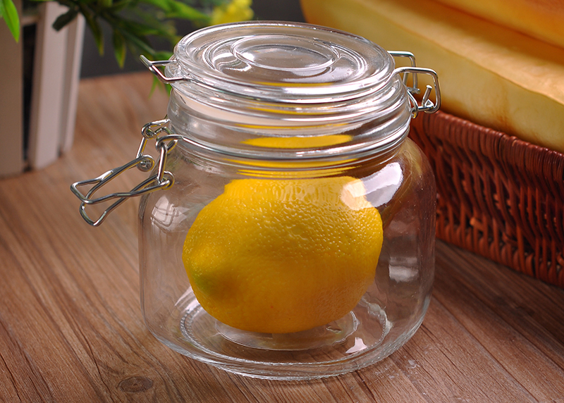 Clear glass squat straight-sided jar with neck finish