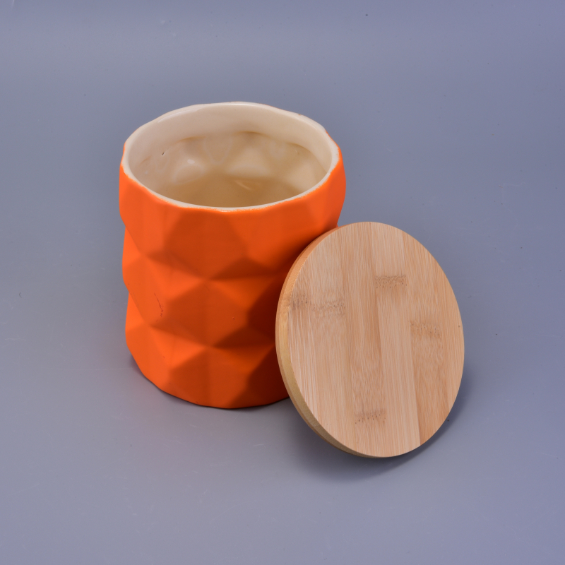 orange matte ceramic candle jar relief surface