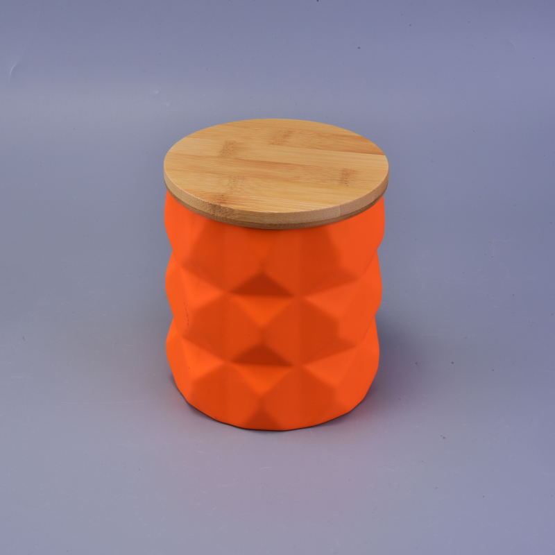 orange matte ceramic candle jar relief surface