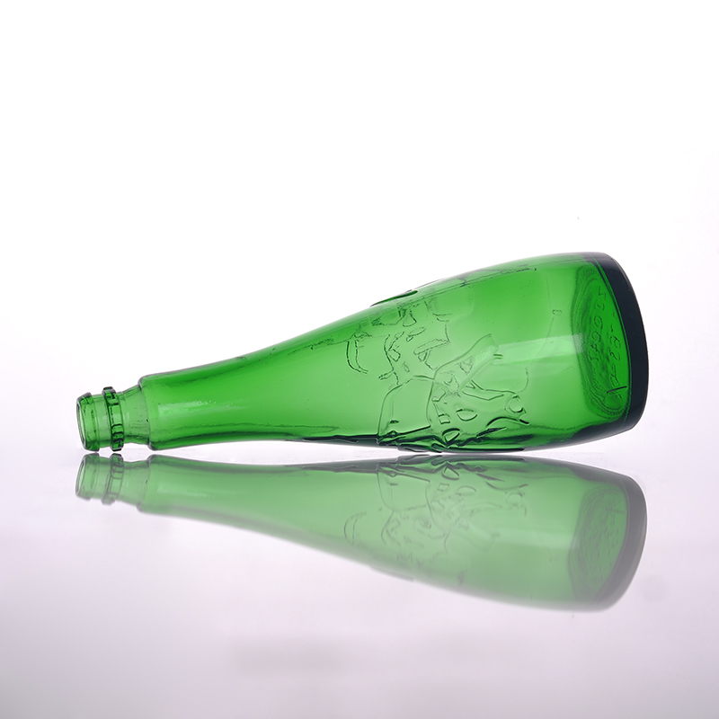 Green flat bottom glass liquor bottle