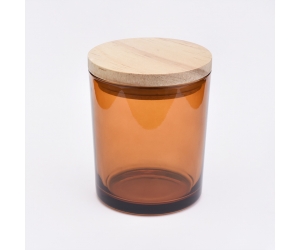 棕色琥珀色玻璃蜡烛罐，带木盖