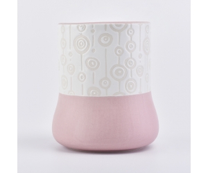 粉红色陶瓷蜡烛罐与独特的图案
