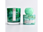 Elegant marbled green glass reed diffuser bottle and glass candle holder