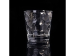 Geometric pattern embossed glass cup