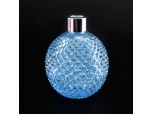 Grenade style blue spray color diffuser bottle
