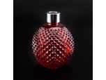 Grenade style red sprayed glass diffuser bottle