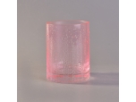 Candelero efecto gota de cristal color rosa candelero