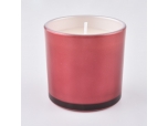 Small glass candle jars with spraying colors