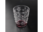 embossed flower pattern glass votive with color spray